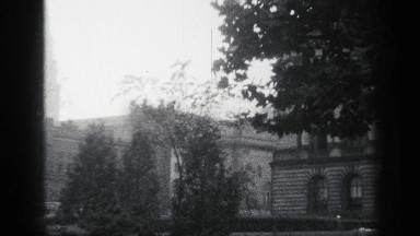 1938: fort is surrounding with trees,cloudy environment,man is running around