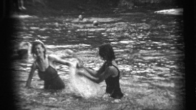 1938: children playing in the water. splashing and having a good time. CLEVELAND