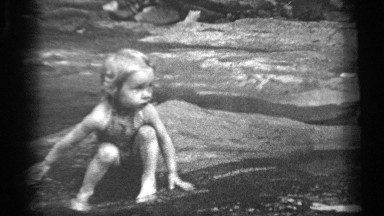 1938: baby girl splashing in creek CLEVELAND OHIO
