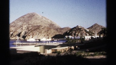 1974: a beautiful sandy beach overlooking an azure blue body of water CABO SAN