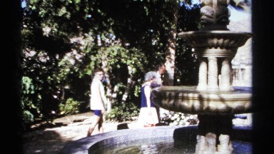 1974: three people strolling around fountain in a garden CABO SAN LUCAS MEXICO