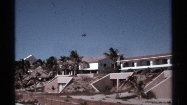 1974: a place that looks like an apartment with roof top and steps also there