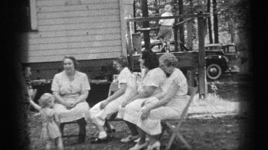 1937: Women Talking Beside a Caravan with Children in Cleveland, Ohio