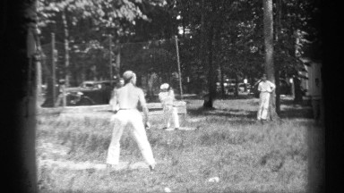 1937: a man with a cap hitting a baseball and reaching first base CLEVELAND OHIO