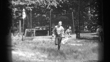 1937: young men playing baseball in a field. CLEVELAND OHIO