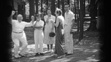 1937: Group of Friends Laugh at Man Doing Silly Dance in Cleveland Ohio