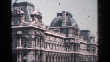 1957: A Massive U-Shaped Building with Columns Fronting All Sides Surrounds a Courtyard