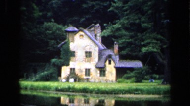 1957: a small house located alone at the beautiful garden and some water also in