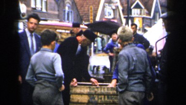 1957: Gathering of Men at Fish Market NETHERLANDS