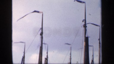 1957: A Place With Large Pillars and Flags Under Morning Sunshine