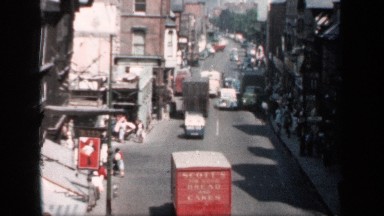 1957: more transport and vehicles are on the road at the morning time and