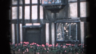 1957: a building that has well kept landscaping. ENGLAND