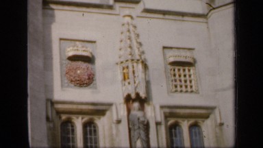 1957: woman exiting from the main door of a church building in england ENGLAND