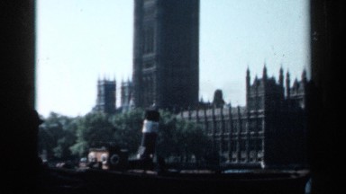 1957: Religious Building Near Water with People Observing