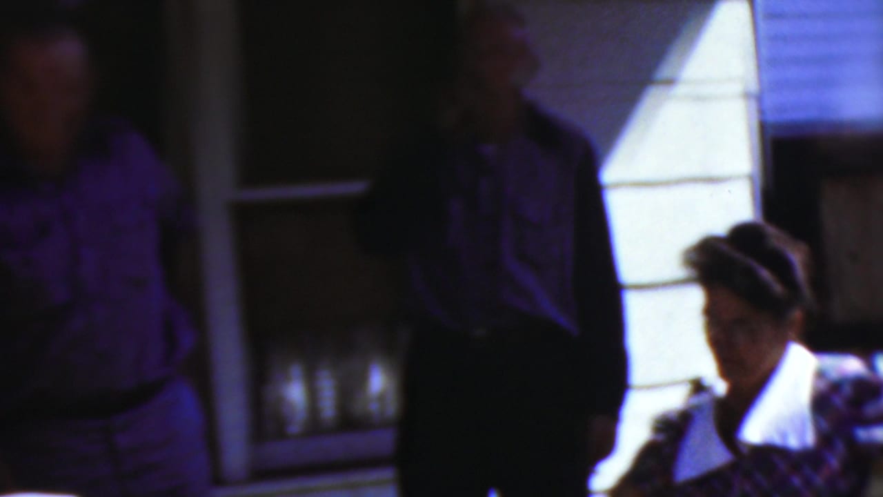 The final frame shows the porch group shifting position, with the woman in purple partly obscured, a man standing in shadow, and a plaid-dressed woman partially visible at the lower right.