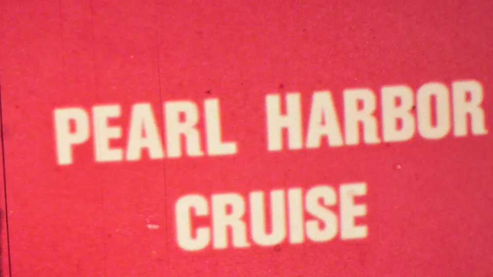 The closing still repeats the red Pearl Harbor Cruise title card in soft 8mm focus with visible grain and slight frame wear.
