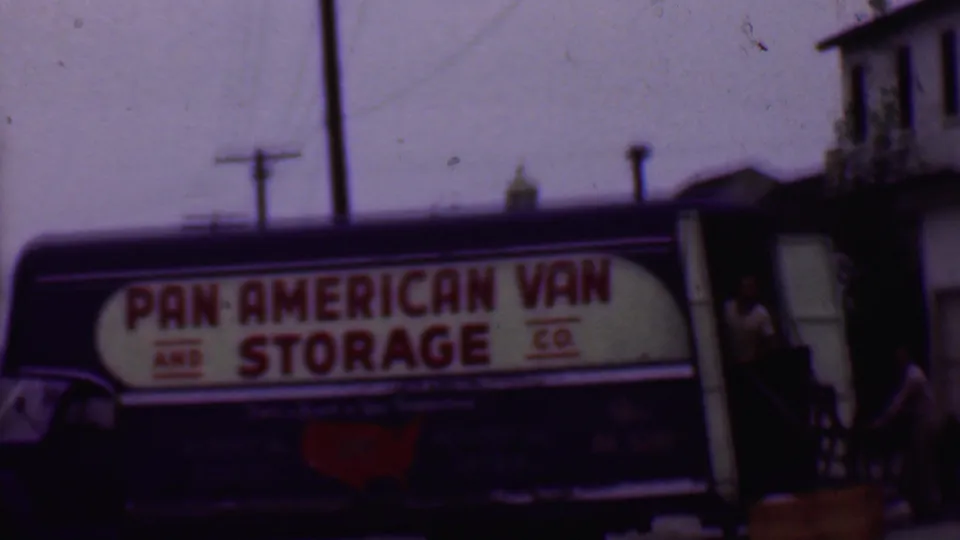 A 1956 Phoenix frame shows the Pan American Van and Storage Co. truck with its rear area open and a person briefly visible near the doorway, alongside poles and wires.