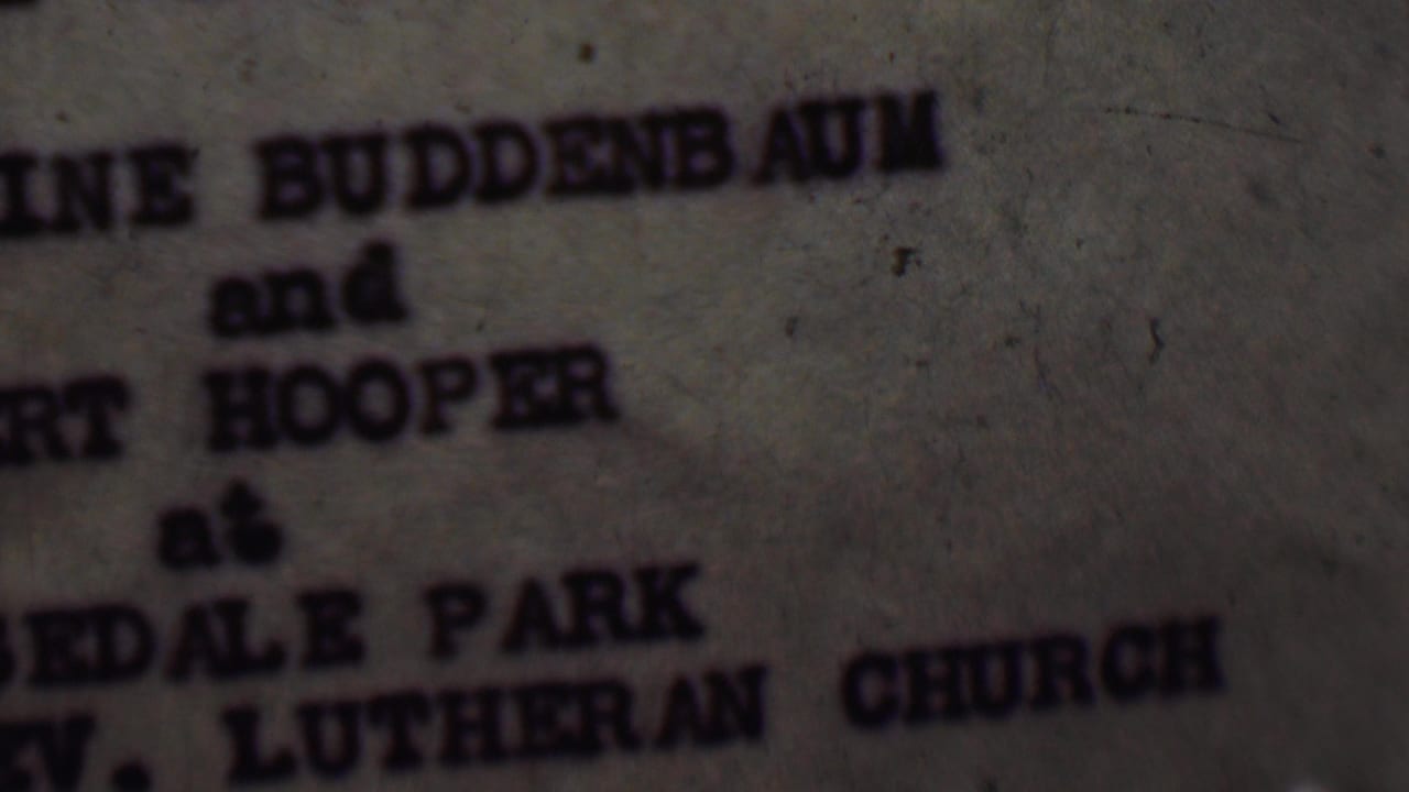 Blurred invitation text naming Buddenbaum and Hooper with Edale Park Lutheran Church visible.