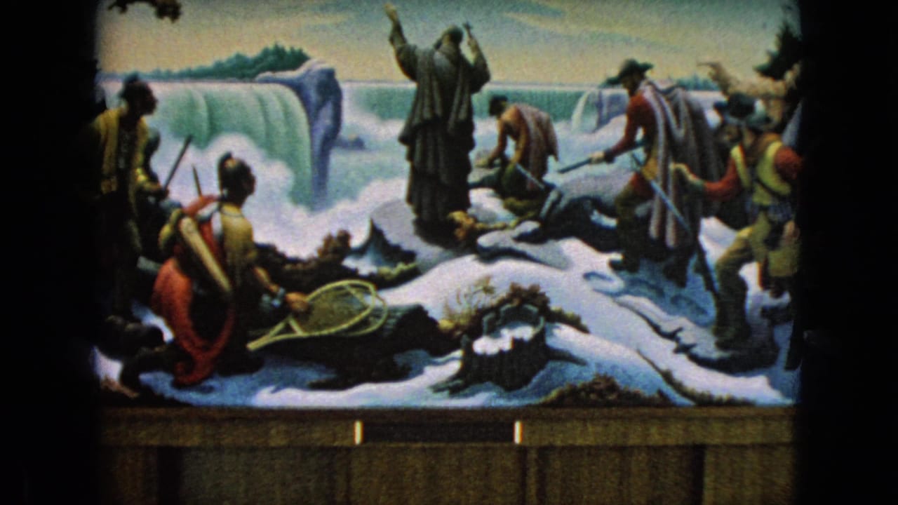1964 8mm frame of a displayed Niagara Falls mural attributed in metadata to Thomas Hart Benton, showing painted frontier figures, snow-covered ground, snowshoes, and waterfall scenery.