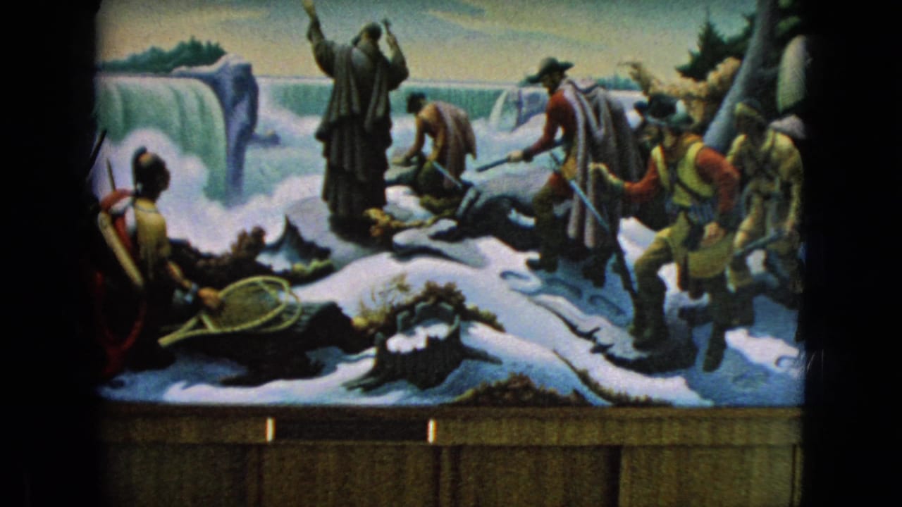 Displayed mural with painted figures gathered on icy ground near a waterfall and a covered wagon edge.