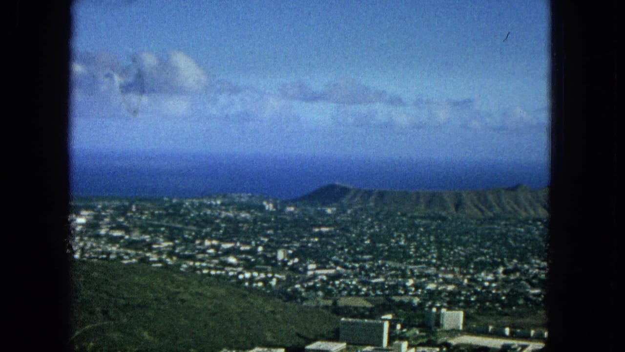 City and coastline view with Diamond Head visible near the horizon.