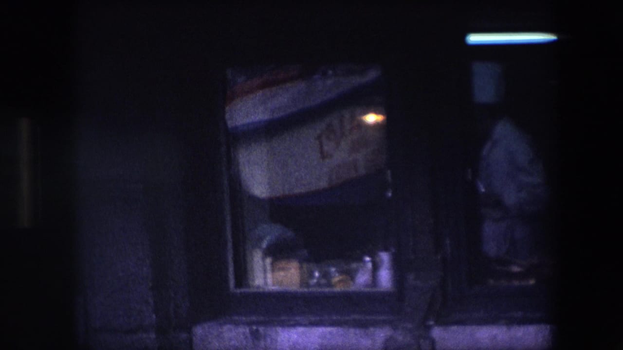 The final frame shifts darker, showing the sign and window area with the chef partly cropped and softened by shadow, glass, and 8mm motion blur.