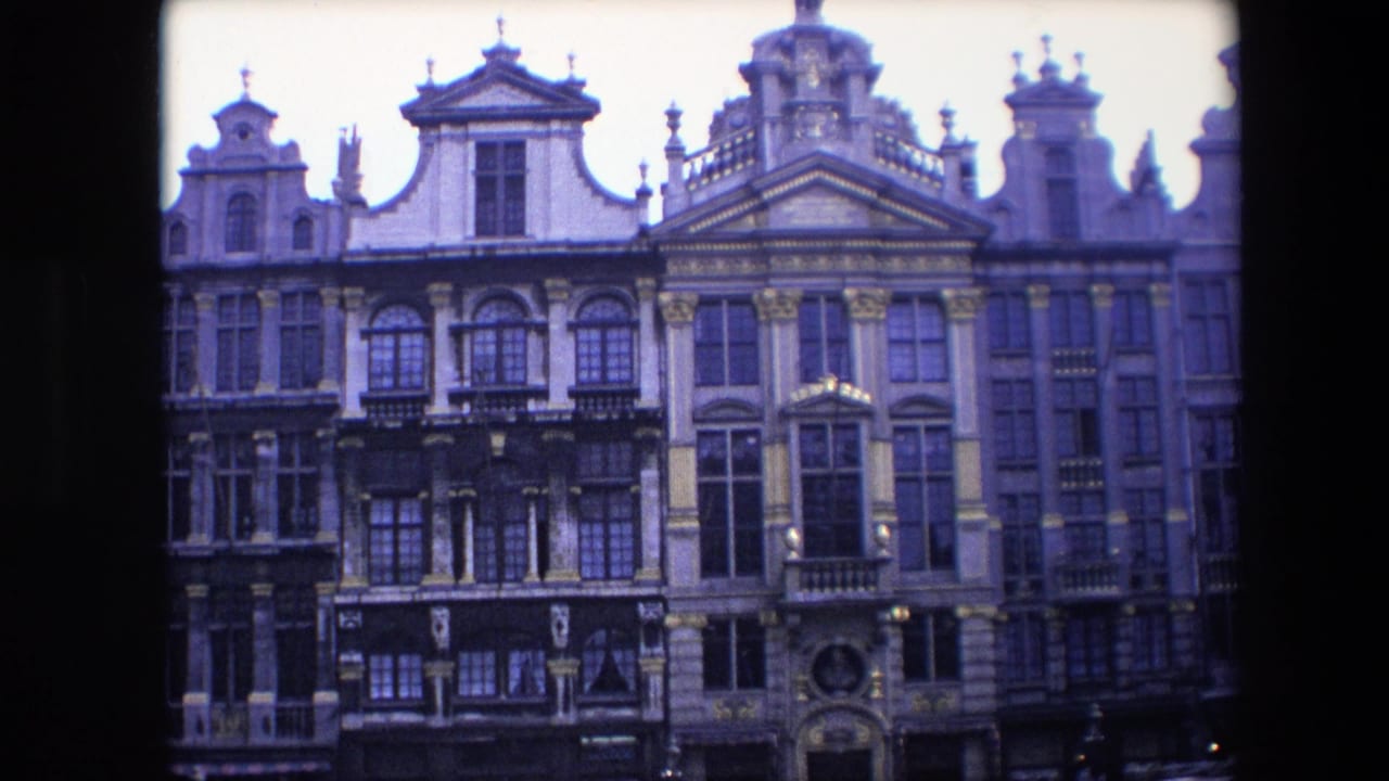 Historic multi-story facades with decorative rooflines and window bays.