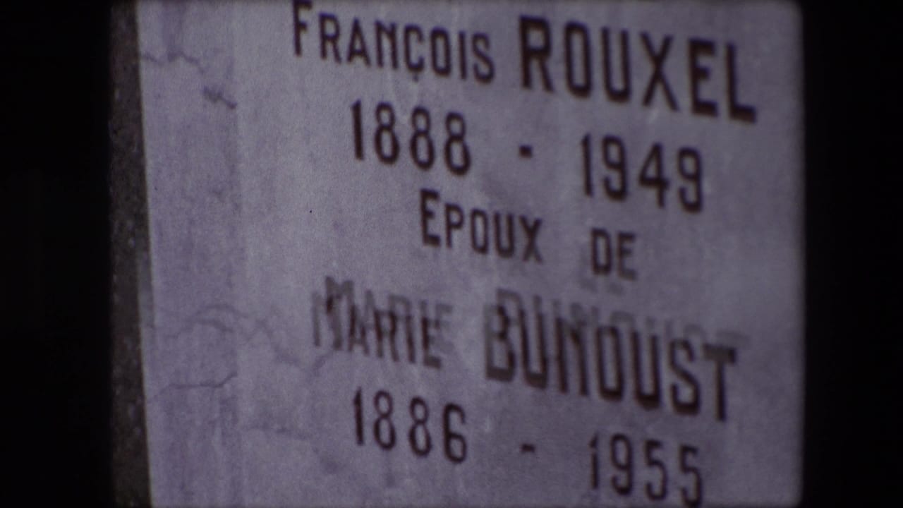 Close-up from the 1967 Calais home movie showing a weathered headstone inscribed for François Rouxel and Marie Bunoust with birth and death dates.