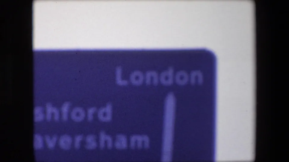 Partial close-up of the same 1967 British road sign, with London readable and Ashford and Faversham partly cropped at the left edge.