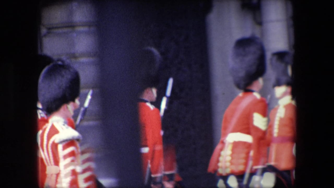Red-coated uniformed figures move past a dark doorway with rifles or staffs visible.