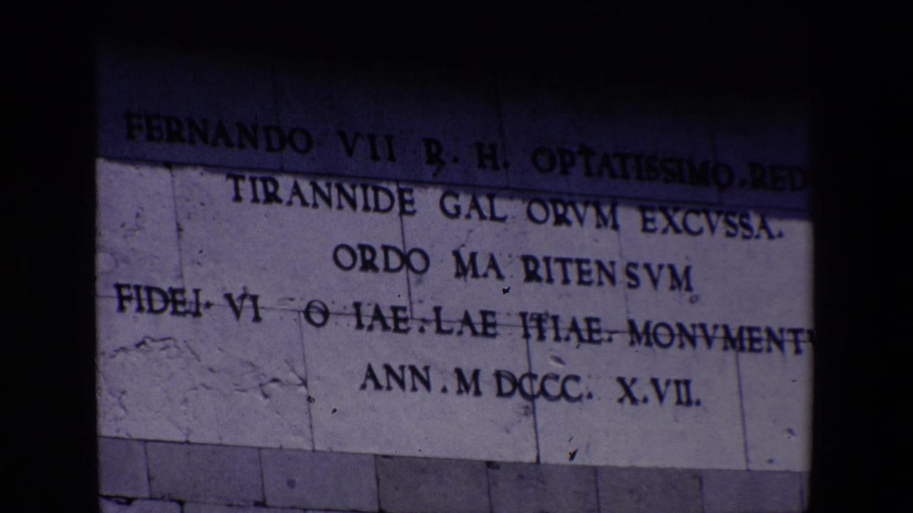 Second view of the same cropped stone inscription on a building wall.