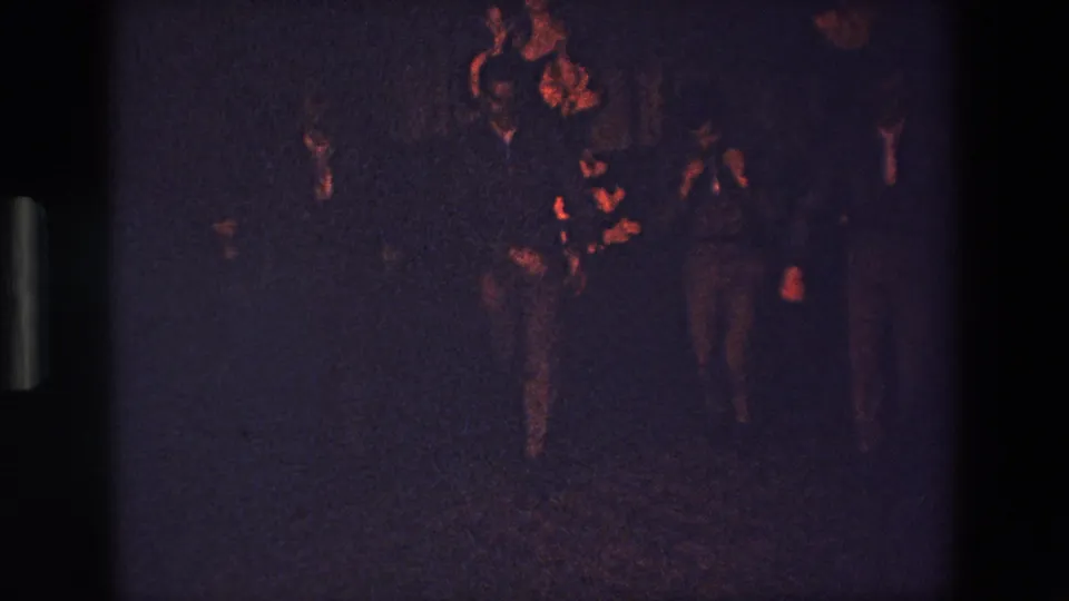 The final frame shows the group still gathered in the shadowed Palermo club scene, with suited figures gesturing or dancing under low red-orange illumination.