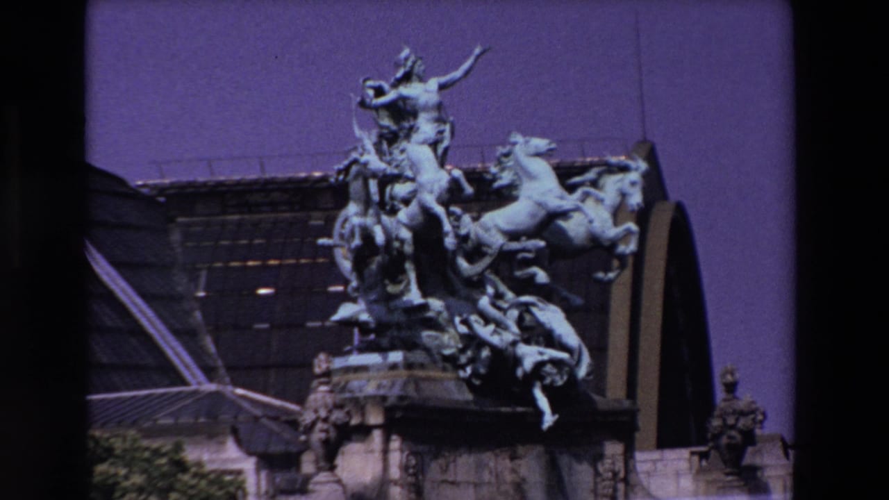 Quadriga sculpture framed against the Grand Palais roof and sky.