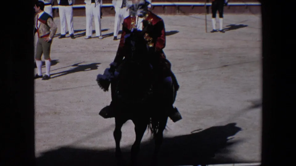 The final frame shows a red-jacketed rider on a dark horse moving through partial shade in the Barcelona arena, with attendants and fence details visible behind.