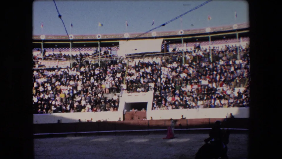 In the final 1971 Barcelona frame, a matador stands in the sandy bullring while a horse and rider appear at the lower right beneath packed stands.
