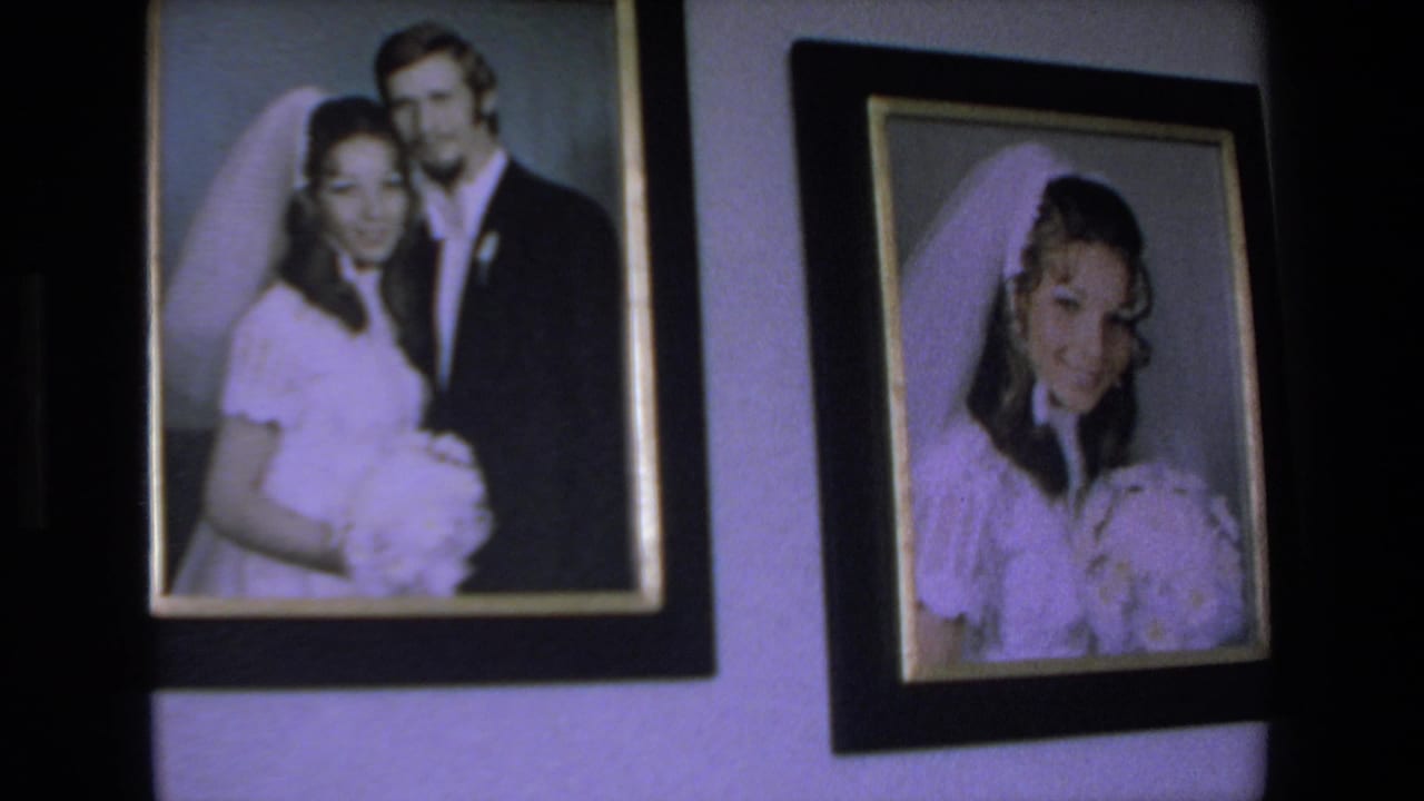 Two framed wedding photographs displayed side by side.