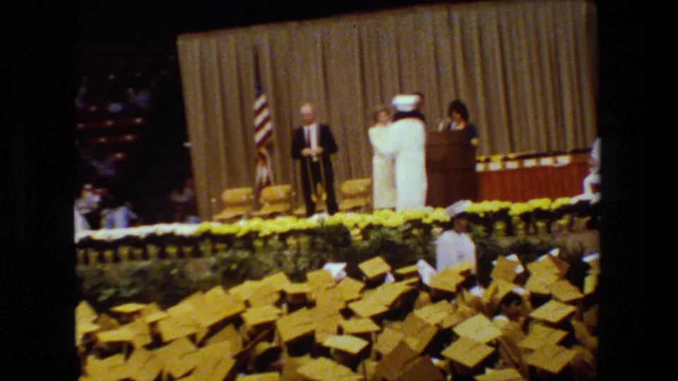The final frame shows the graduation stage with an American flag, podium speaker, officials in academic dress, and rows of yellow mortarboards below.