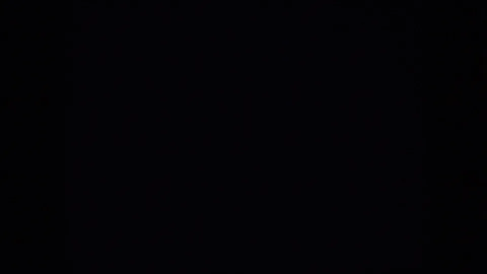 Nearly black 8mm frame from the 1958 Pennsylvania underwater clip, likely a brief gap or underexposed transition between visible shots.