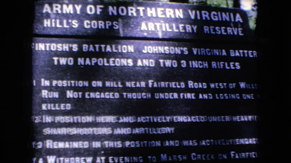 1966 8mm close-up of a Civil War battlefield marker describing the Army of Northern Virginia, Hill's Corps, McIntosh's Battalion, and artillery positions.