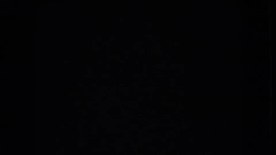 Dark end frame from the 1966 Ohio tunnel-driving clip, with little visible detail remaining in the scanned 8mm image.
