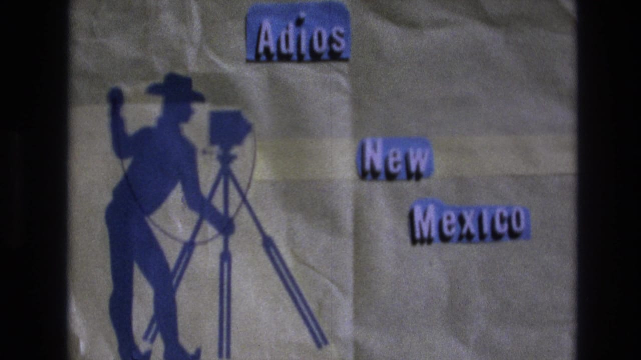 Adios New Mexico card with cowboy camera silhouette and cut-out lettering.