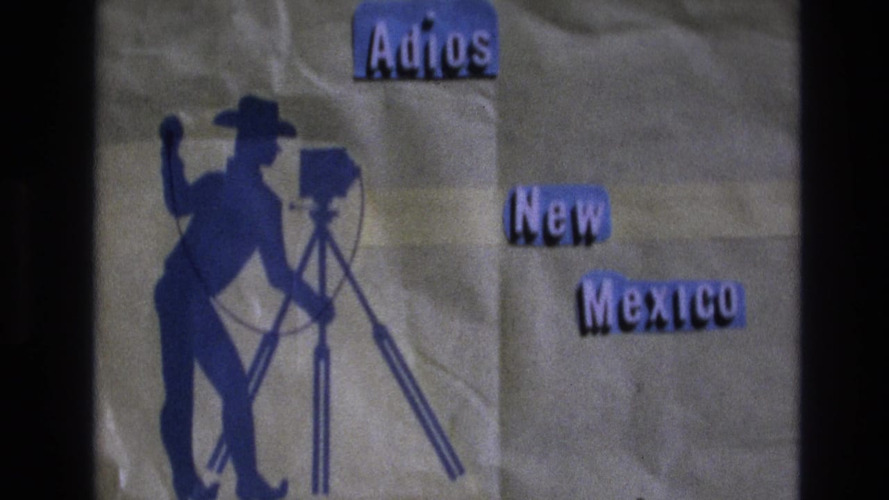 Handmade Adios New Mexico title card with blue cowboy photographer silhouette and tripod camera.