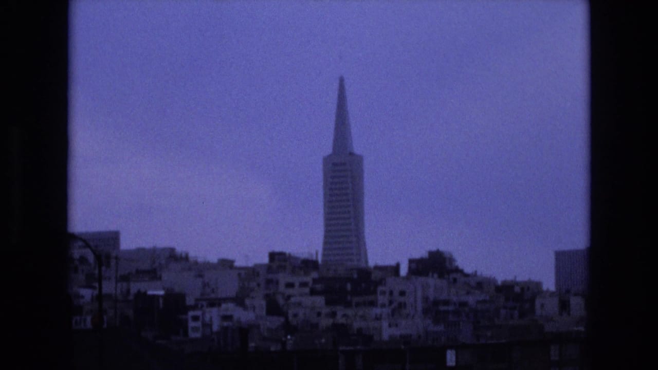 San Francisco skyline with the Transamerica Pyramid behind low waterfront buildings.