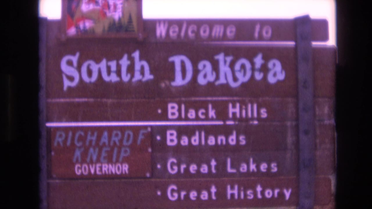 Closer view of the South Dakota welcome sign with listed attractions.