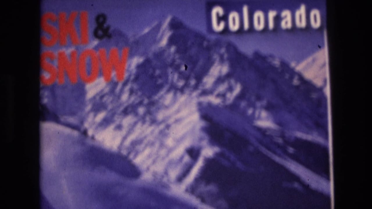Purple-tinted mountain advertisement with red SKI & SNOW text and white Colorado lettering.