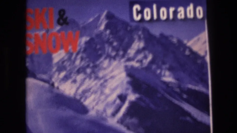1974 Vail, Colorado frame showing the Colorado ski-and-snow advertisement repeated with visible black border and soft 8mm texture.