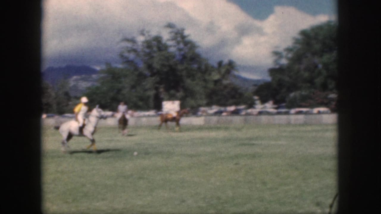 1959 Oahu footage shows a polo rider on a white horse in the foreground with other riders across the field.