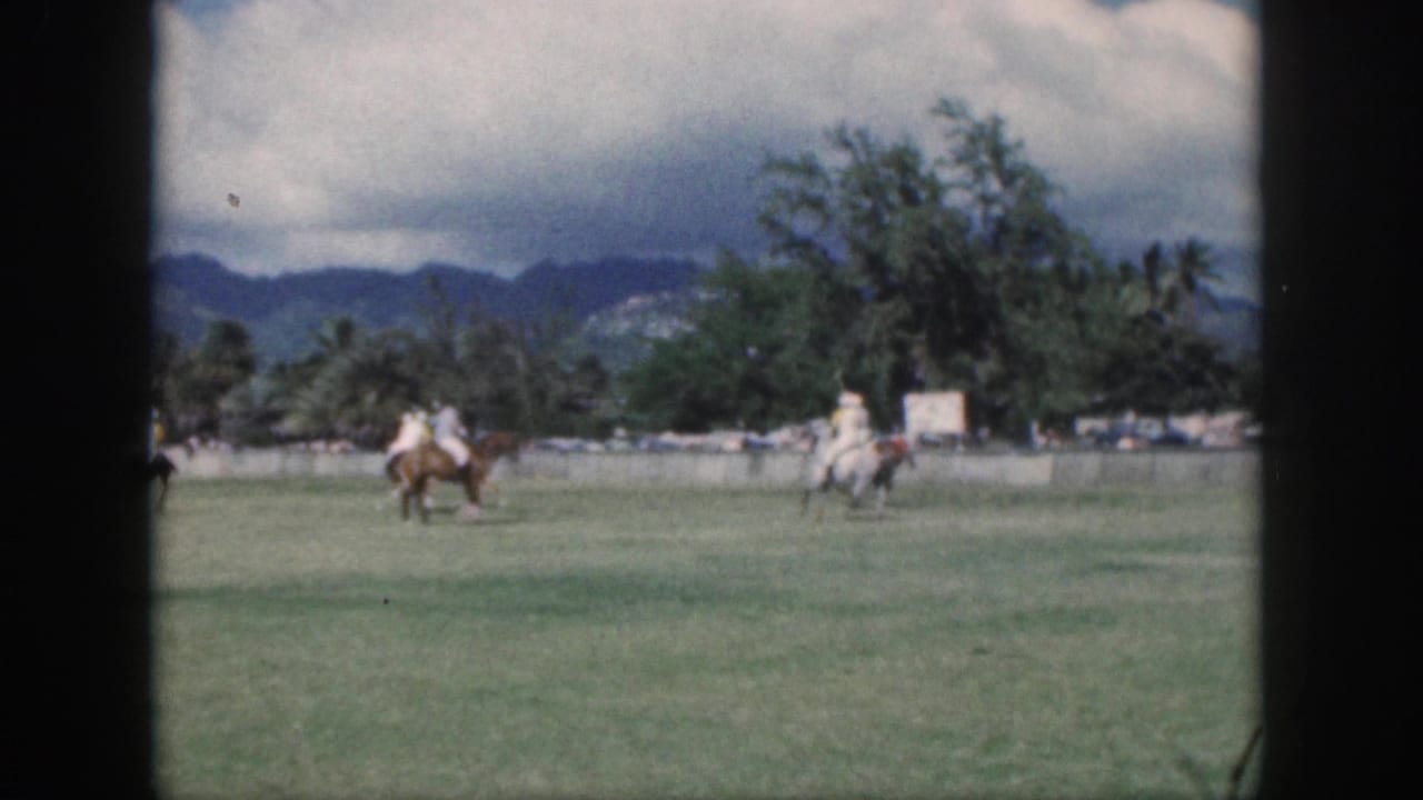 A softer 1959 Oahu frame shows riders and horses on the grass field, backed by trees, cars, mountains, and a cloudy sky.