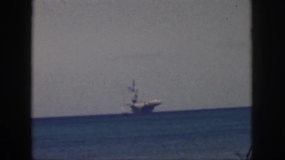 Soft 8mm view from Oahu in 1959 showing a large distant ship crossing the ocean horizon.