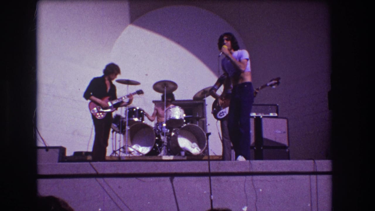 1973 Medford, New Jersey frame with a lead singer at the microphone and band members playing behind him.